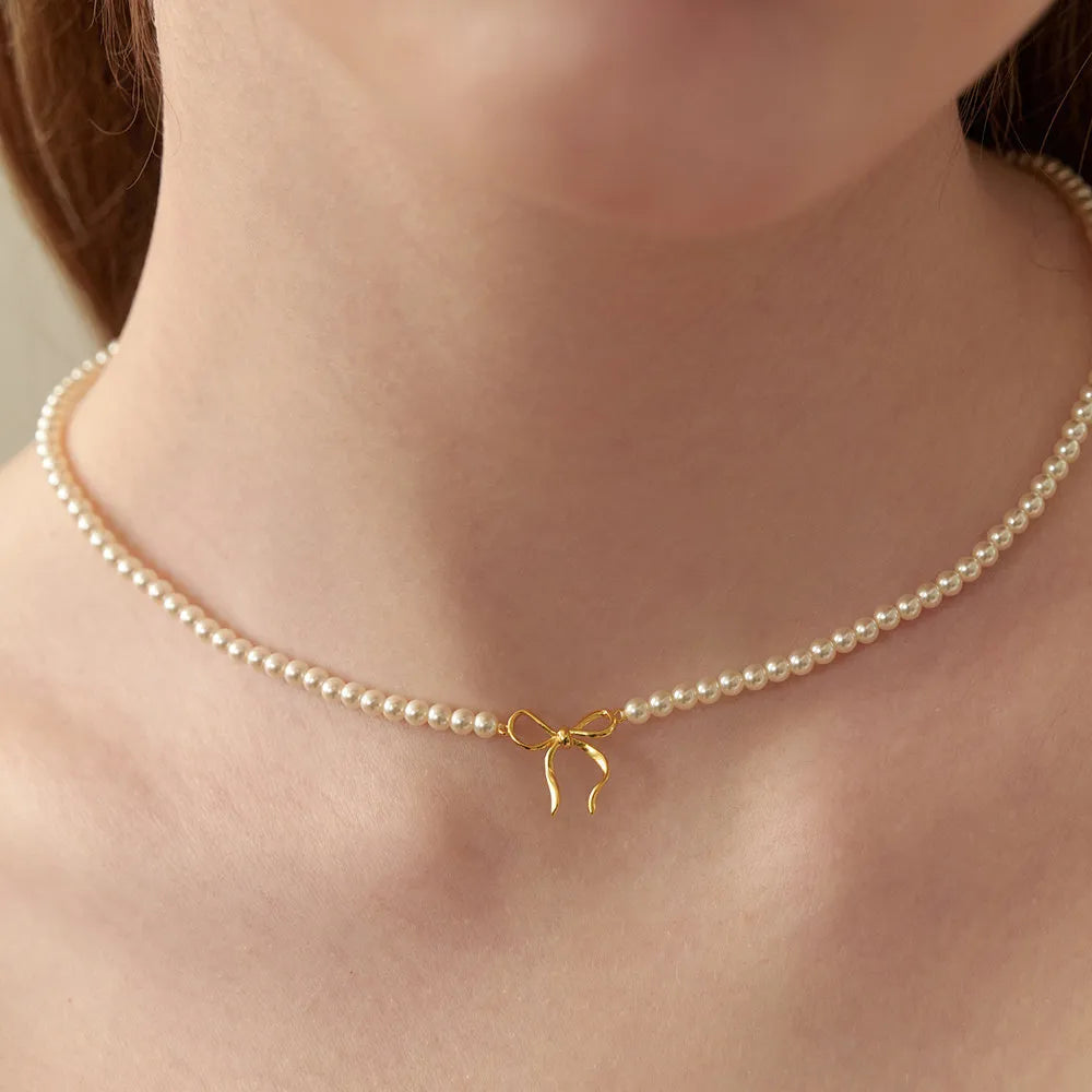 Collier nœud perles cuivrées