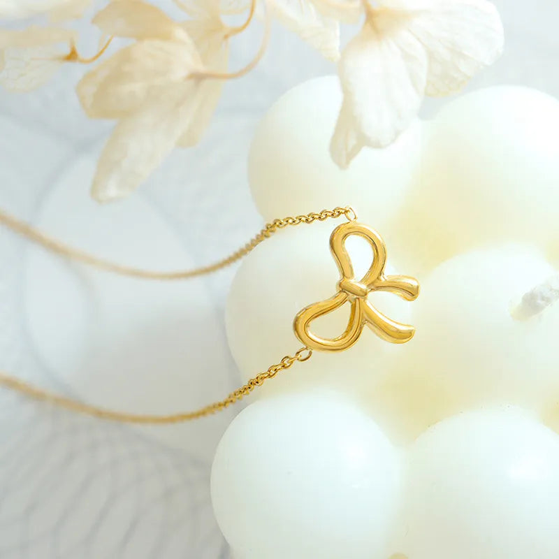 Collier pendentif arc en acier au titane