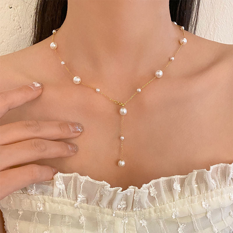 Chaîne élégante à clavicule, en acier titane, petite et fraîche, ciel étoilé, perle, pompon simple, polyvalente, collier personnalisé pour femme