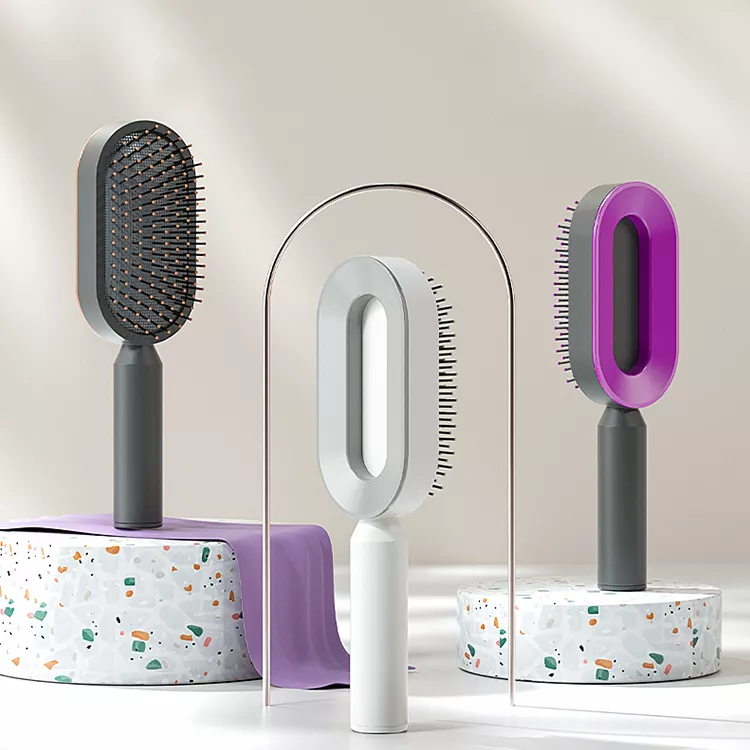 Conception de nettoyage par pression améliorée Peigne coussin d'air pour cheveux longs de femme Peigne de massage à airbag Peigne domestique