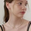 Collier nœud perles cuivrées