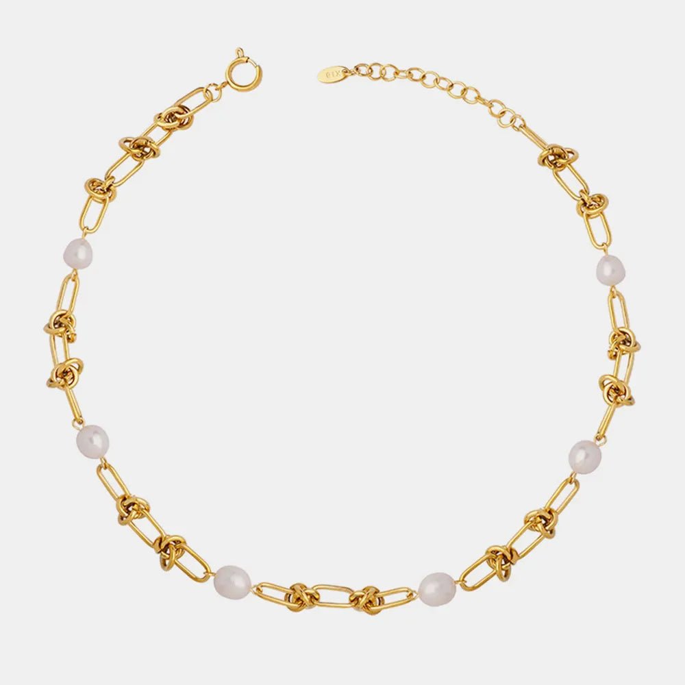 Collier en acier titane et perles d'eau douce