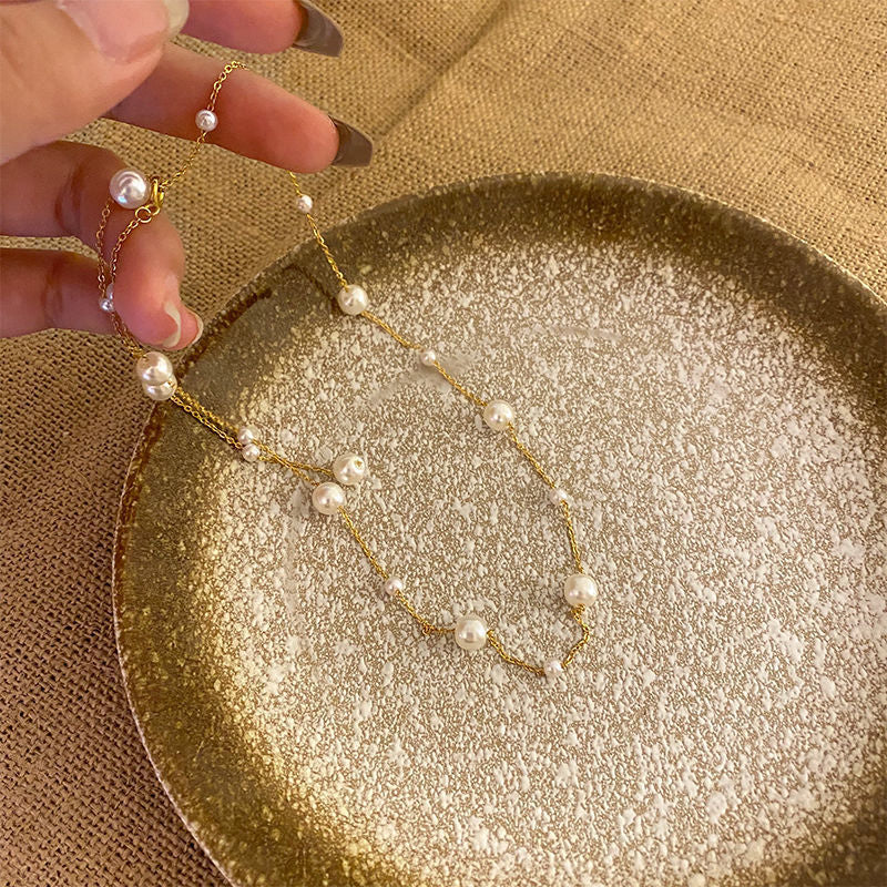 Chaîne élégante à clavicule, en acier titane, petite et fraîche, ciel étoilé, perle, pompon simple, polyvalente, collier personnalisé pour femme