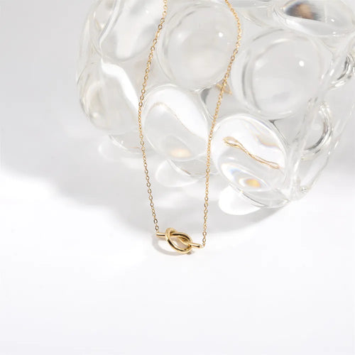 Collier noué plaqué or 18 carats