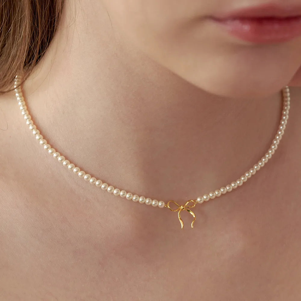 Collier nœud perles cuivrées