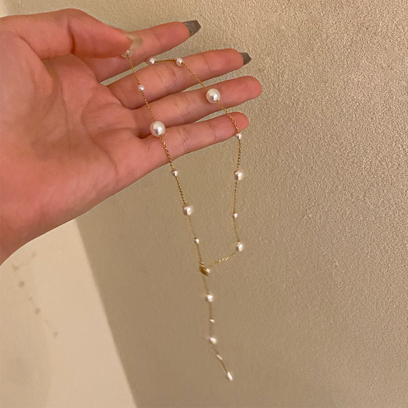Chaîne élégante à clavicule, en acier titane, petite et fraîche, ciel étoilé, perle, pompon simple, polyvalente, collier personnalisé pour femme