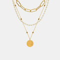 Collier triple couche en acier titane avec perles synthétiques