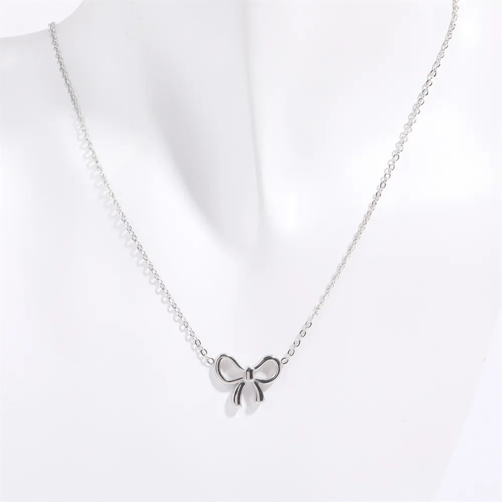 Collier pendentif arc en acier au titane