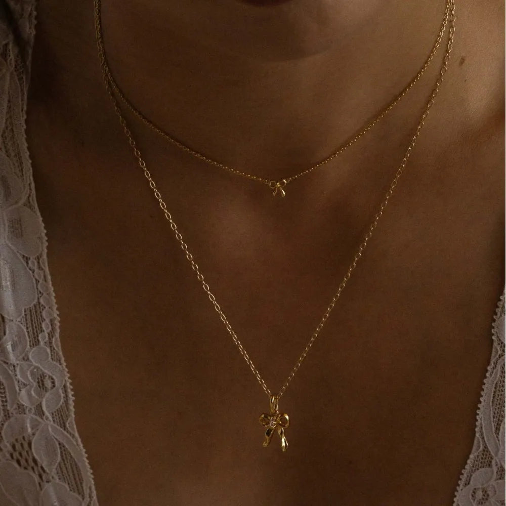 Collier avec nœud en plaqué or 18 carats