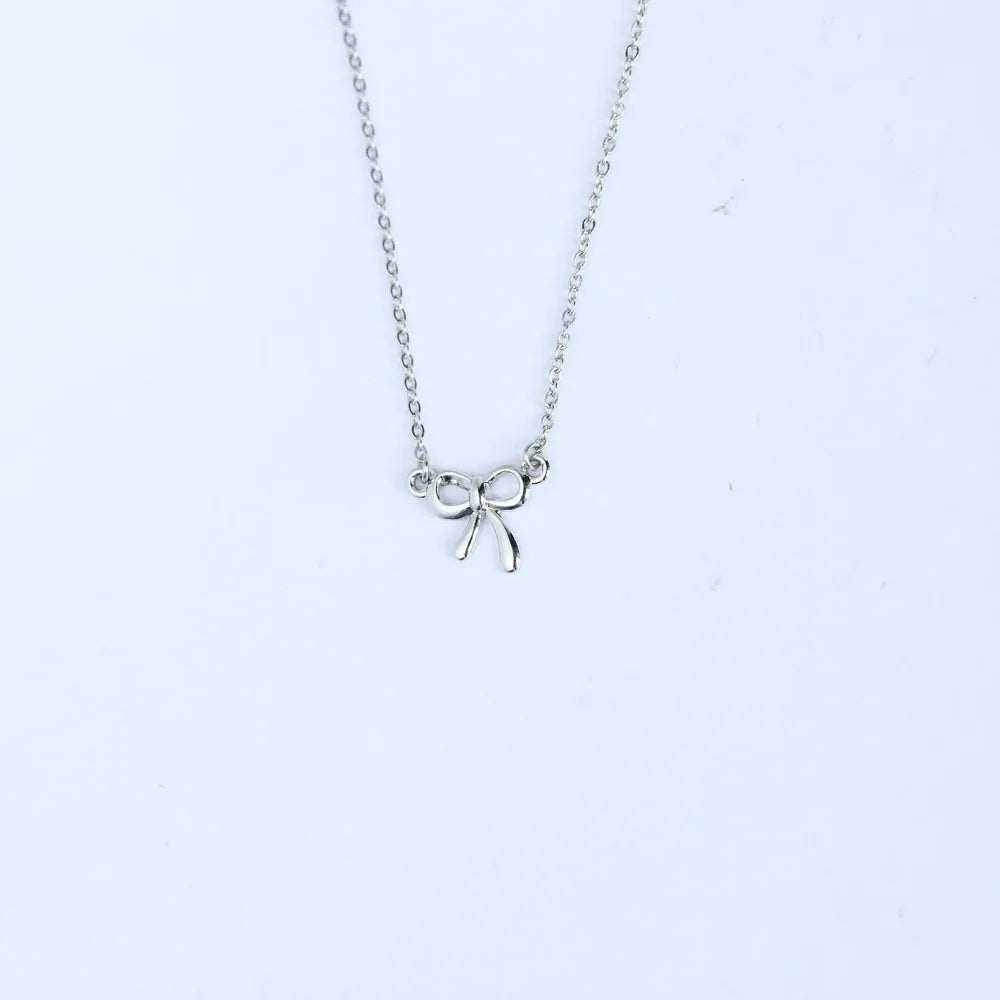 Collier avec nœud en plaqué or 18 carats