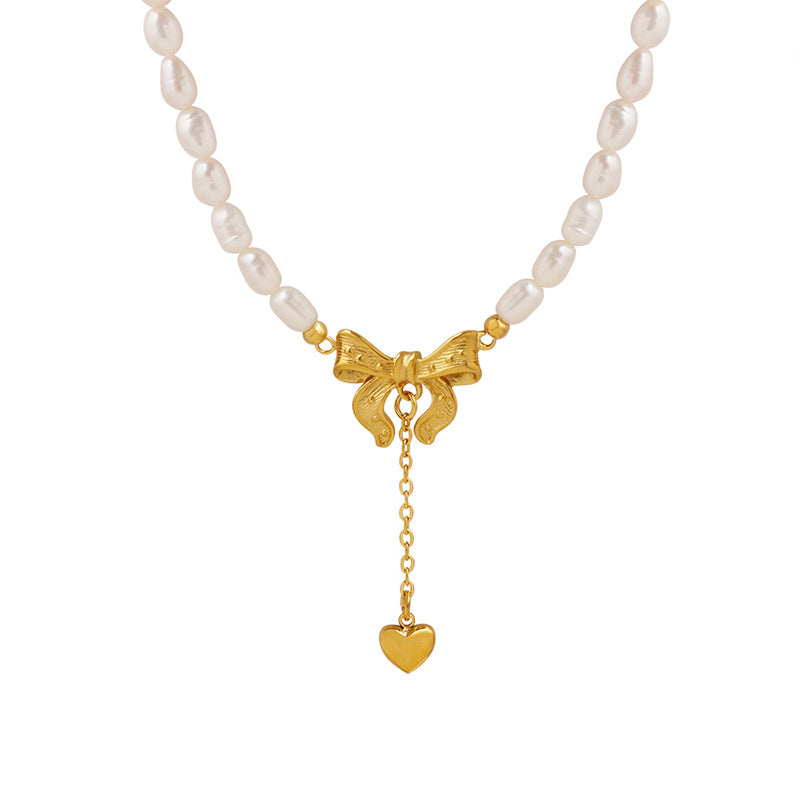Collier cœur en acier titane et perles d'eau douce