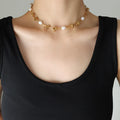 Collier en acier titane et perles d'eau douce